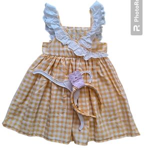 Tommy Bahama yellow and white plaid dress with fluttery sleeves and head…